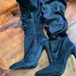 Knee high heeled boots